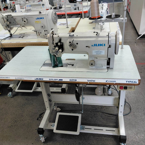 Juki LU-1508N Walking foot machine on table and stand